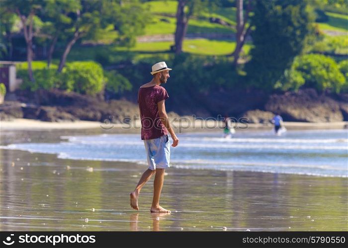 Man in Hat on a Tropical Beach.Jimbaran.Bali.Indonesia.