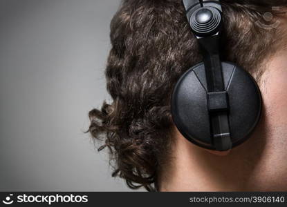 man in headphones listening to music