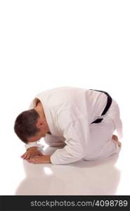 Man in karate-gi in the seiza position