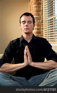 Man in meditation pose