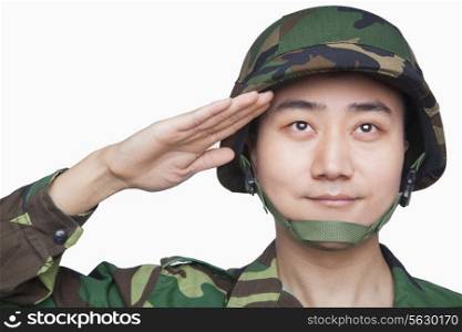 Man in military uniform saluting