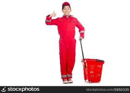 Man in red coveralls with shopping supermarket cart trolley