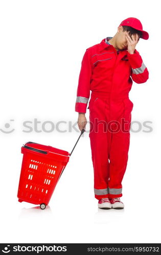 Man in red coveralls with shopping supermarket cart trolley