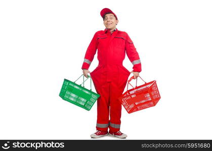 Man in red coveralls with shopping supermarket cart trolley