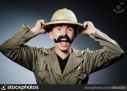 Man in safari hat in hunting concept