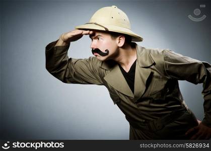 Man in safari hat in hunting concept