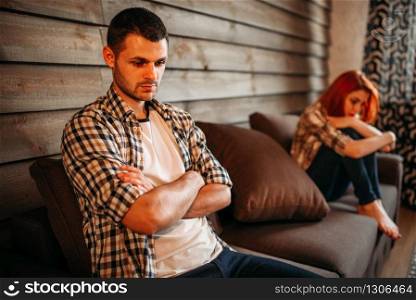 Man in stress and unhappy woman, family quarrel, couple in conflict. Problem relationship