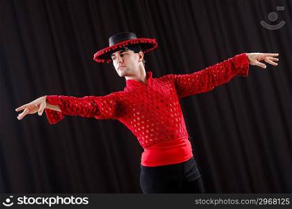Man in studio dancing spanish dances