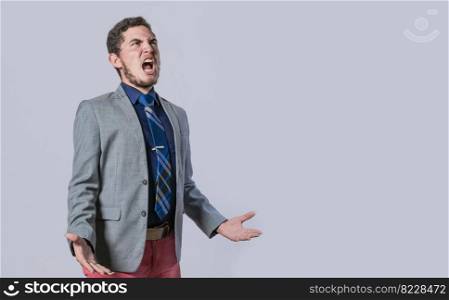 Man in suit screaming loud, Desperate man yelling over isolated background, Business man frustrated yelling