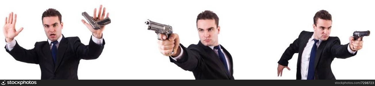 Man in suit with gun isolated on white 