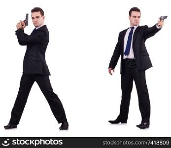 Man in suit with gun isolated on white 