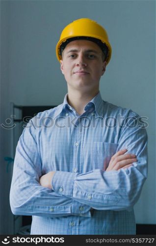 Man in the construction helmet