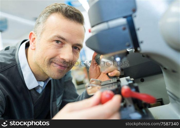 man in the lab fixes glasses for vision
