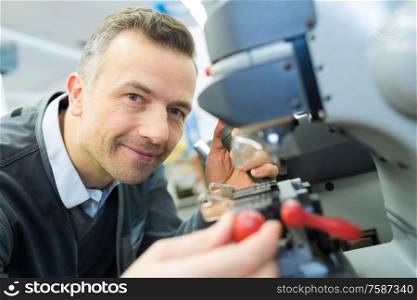man in the lab fixes glasses for vision