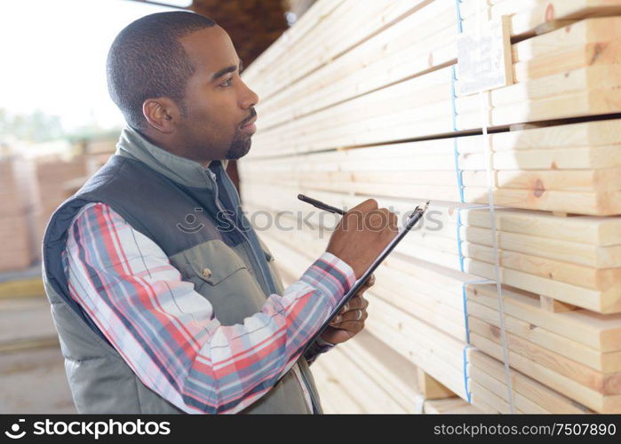 man in the lumber yard
