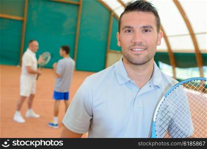 man in the tennis court