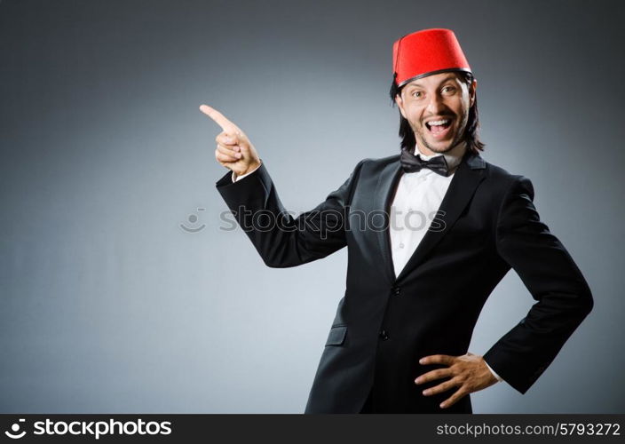 Man in traditional turkish hat and dress