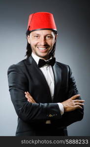 Man in traditional turkish hat and dress