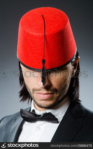 Man in traditional turkish hat and dress