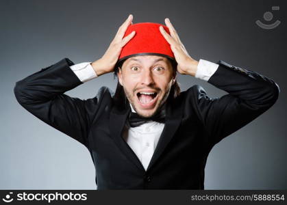 Man in traditional turkish hat and dress