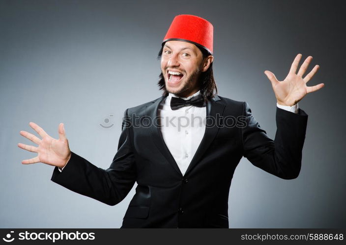 Man in traditional turkish hat and dress