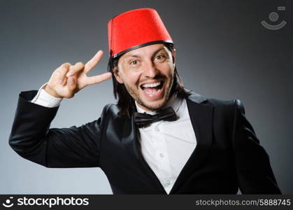 Man in traditional turkish hat and dress