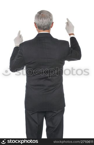 Man in Tuxedo Arms Rasied Conducting