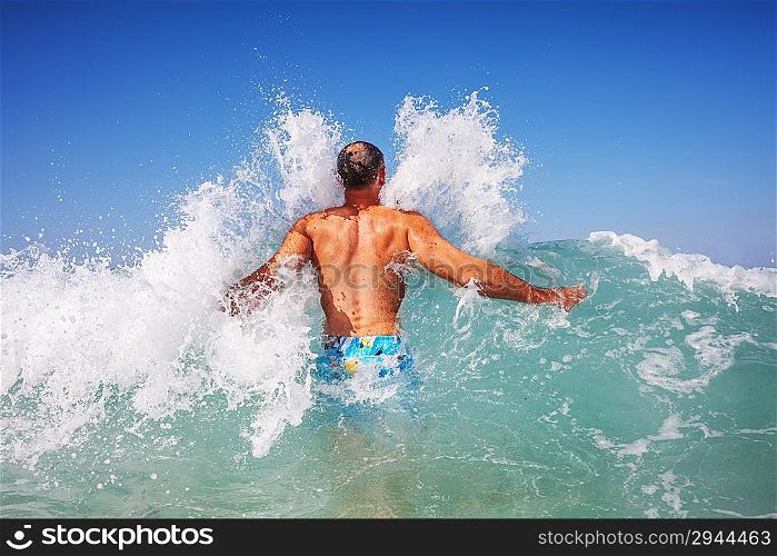 man in wave