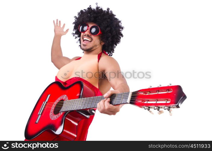 Man in woman clothing with guitar