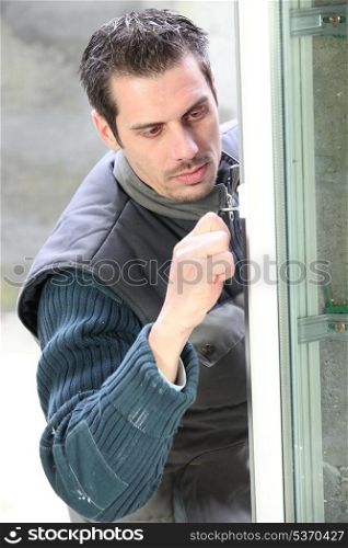 Man installing double-glazed window