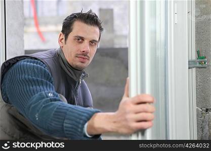 Man installing windows