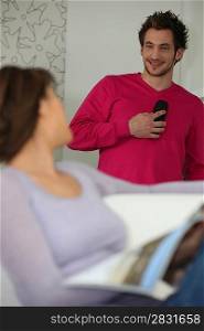 Man interrupting cal to speak to girlfriend