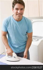 Man Ironing Shirt