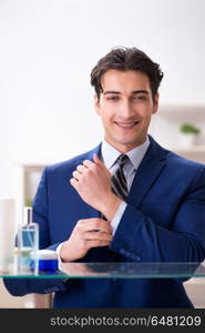 Man is getting dressed up for work in bathroom