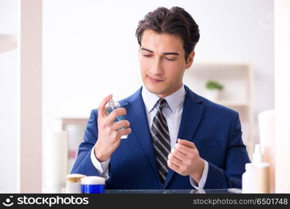 Man is getting dressed up for work in bathroom