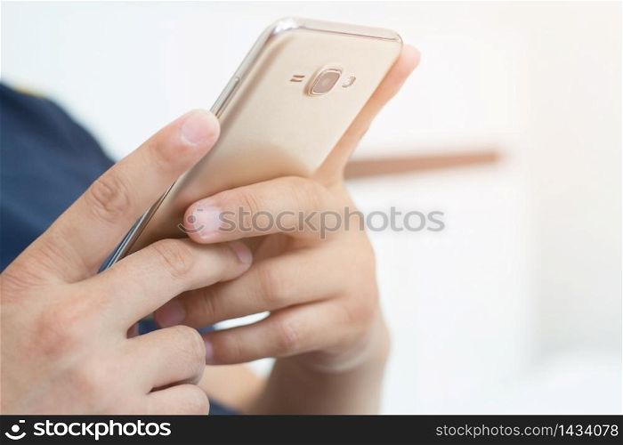 man is using a telephone to contact customers