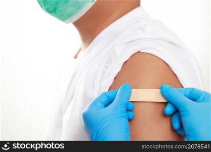 Man is vaccinated against COVID-19 to build immunity.