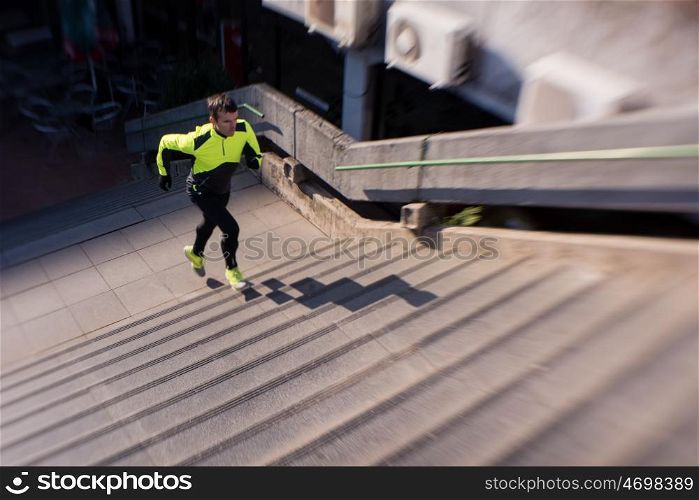 man jogging at cold autumn mornigng