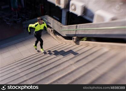 man jogging at cold autumn mornigng