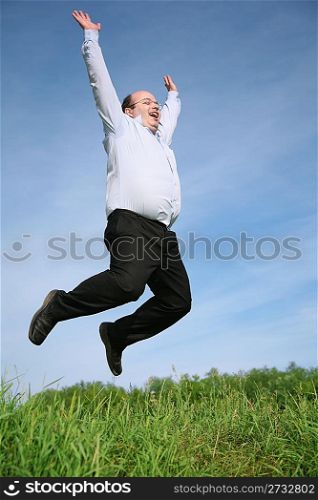 man jumping grass