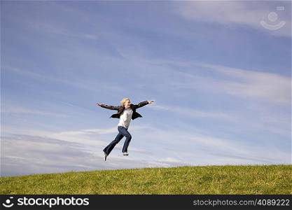 Man jumping on grass