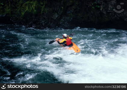 Man Kayaking