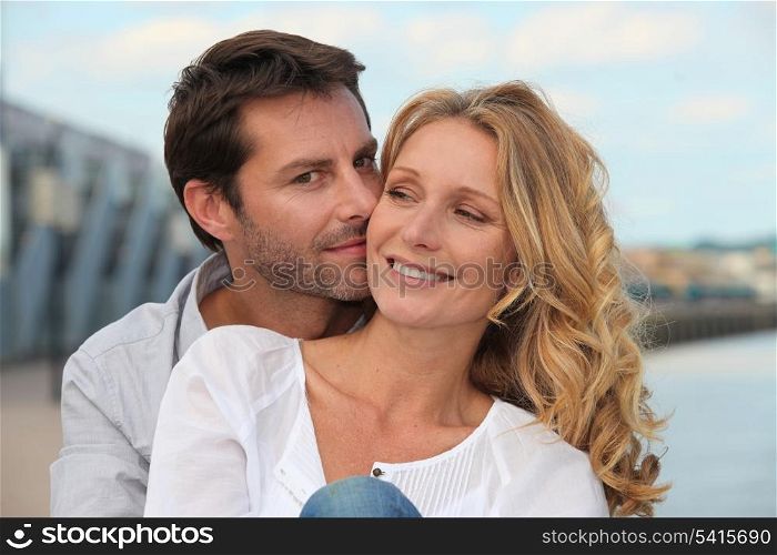Man kissing his partner