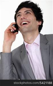 Man laughing on phone