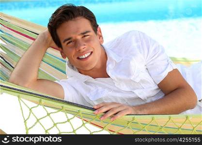 Man laying in hammock