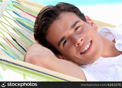 Man laying in hammock