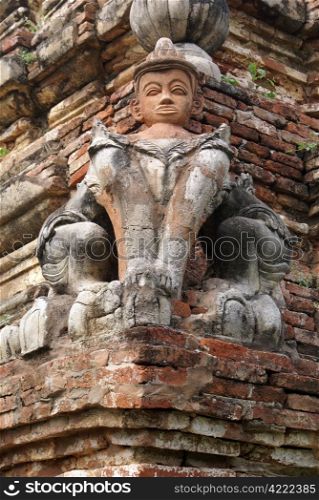 Man-lion on the corner of brick stupa in INwa, Mandalay, Myanmar