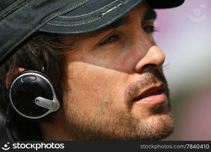 man listening a music in headphones