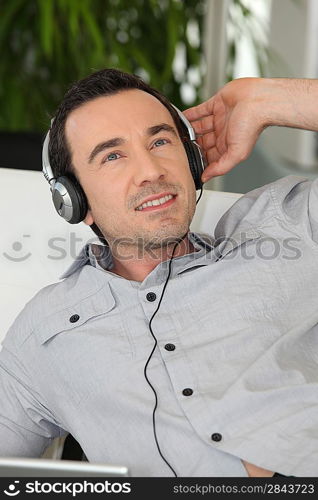 man listening to music