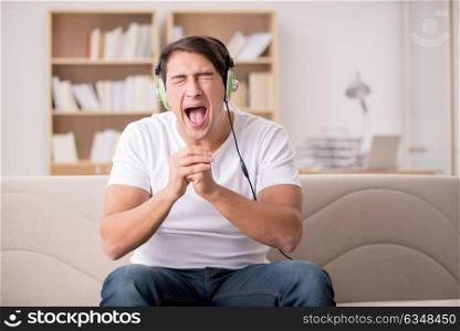 Man listening to music at home